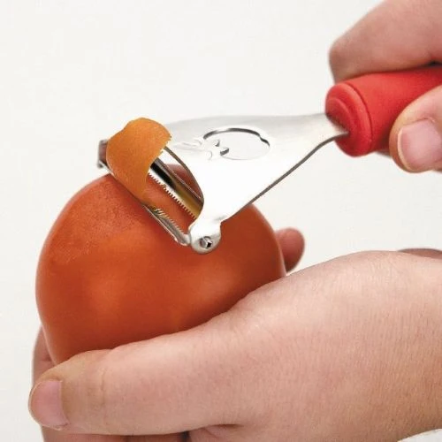 Éplucheur tomates inox ergonomique